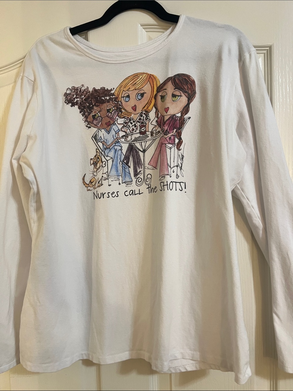 Women’s Long-Sleeve White Graphic Tee - Nurses Call the Shots